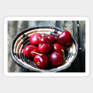 Red cherries in a basket. Sticker